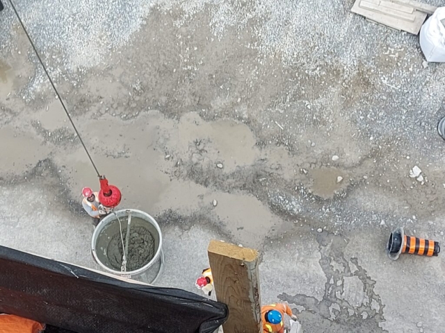 Top view of full concrete hopper ready to be lifted to the pier cap