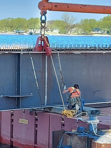 Securing the girder piece to the barge