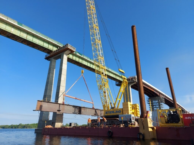 200 ton crane starting to lift the first haunch piece to pier cap 12