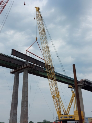 200 ton crane lowering the second haunch piece into place