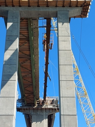 View from underneath of the installation of the approach girder