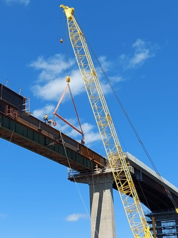 Removing the Crosby clamps/spreader bar from the first approach girder piece