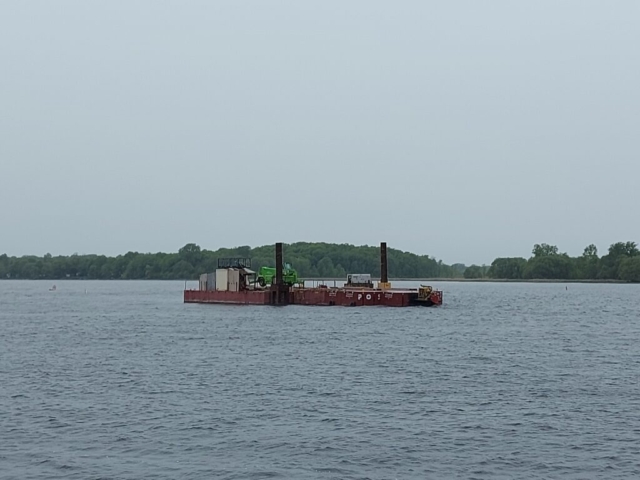 Moving the man lift on the barge