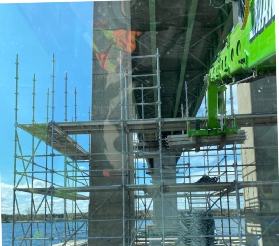 Using the man lift for scaffolding installation