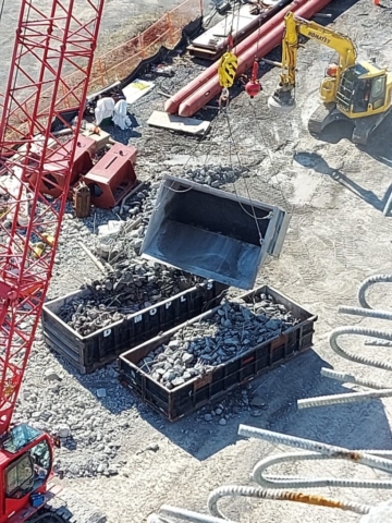 Top view of containment bin being emptied