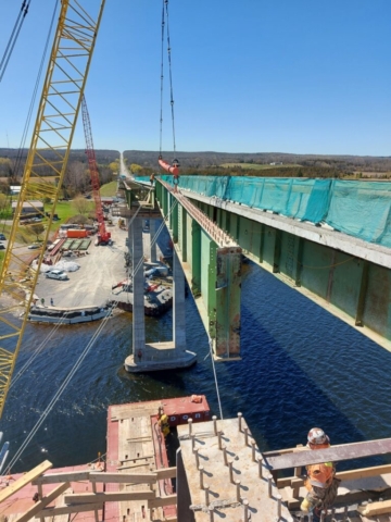 Starting to lower the second section of girder between piers 11 and 12