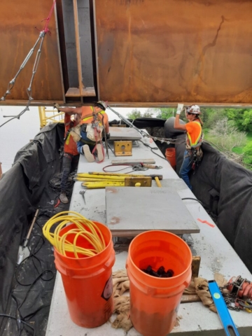 Installing the haunch girder on pier cap 12