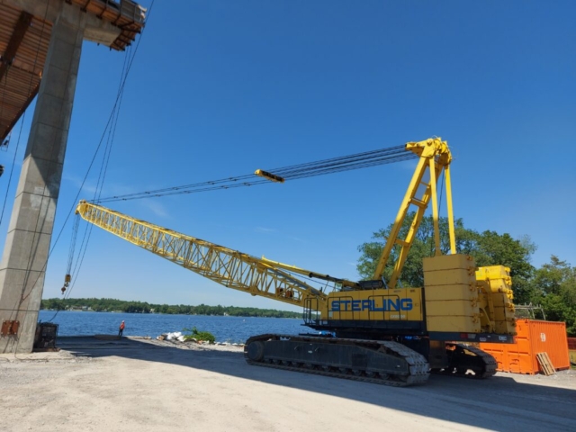 Preparing the 200 ton crane to be loaded on the barge