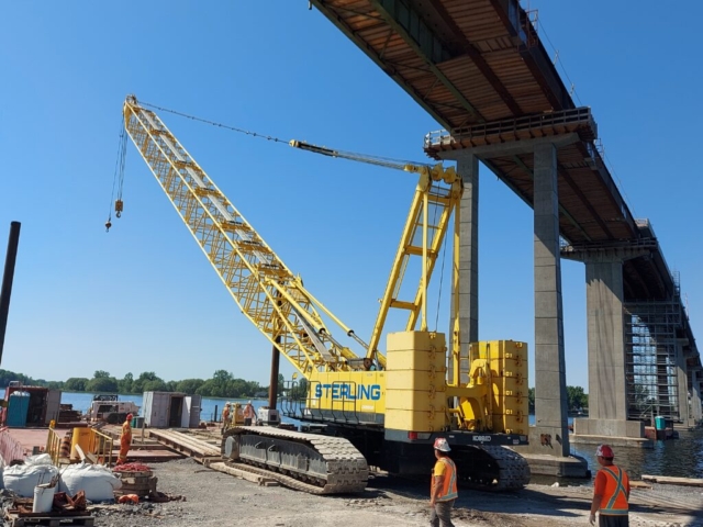 Loading the 200 ton crane onto the barge