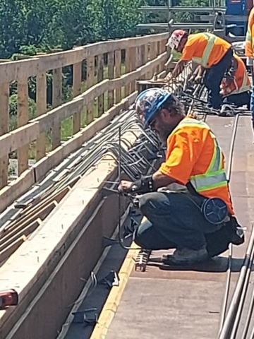 Installing barrier wall rebar