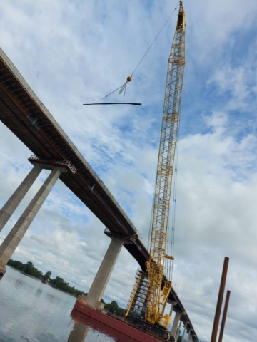 200 ton crane lifting rebar to the deck