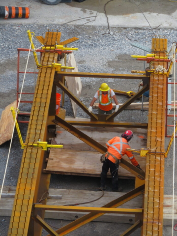 Installing a section of false decking in the second approach girder