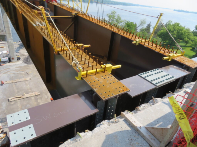 Pier 14 approach girder lowered into place