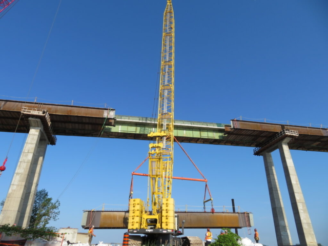 Starting to lift the drop-in girder