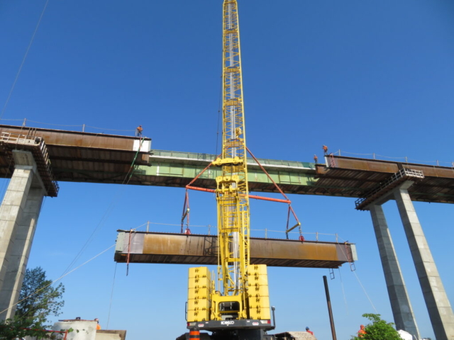 Drop-in girder mid-lift