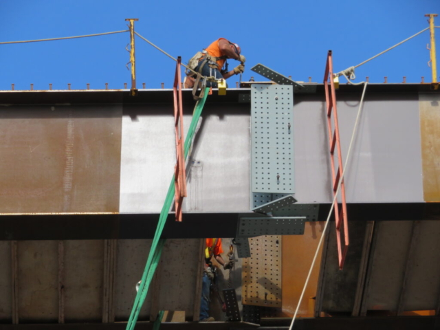 Connecting the drop-in and haunch girder