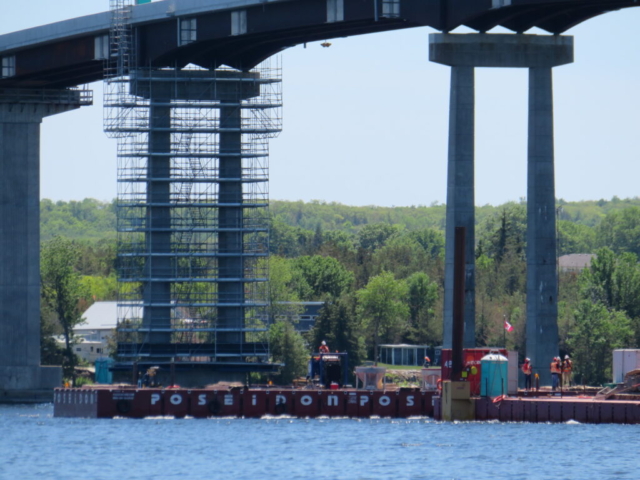 Service barge delivering the concrete to pier 6 for placement