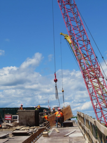 110 and 200 ton cranes, installing the work platform