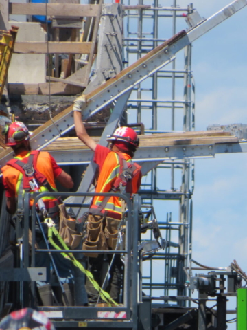 Close-up, installing the work platform brackets