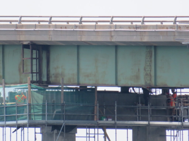 Installing formwork for concrete placement on pier 4