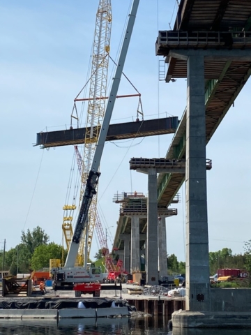 South view of the pier 13 haunch girder being lifted