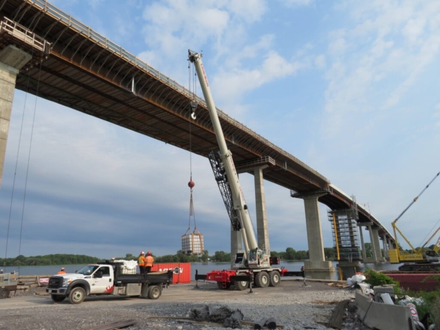 Unloading the water totes in preparation for concrete placement