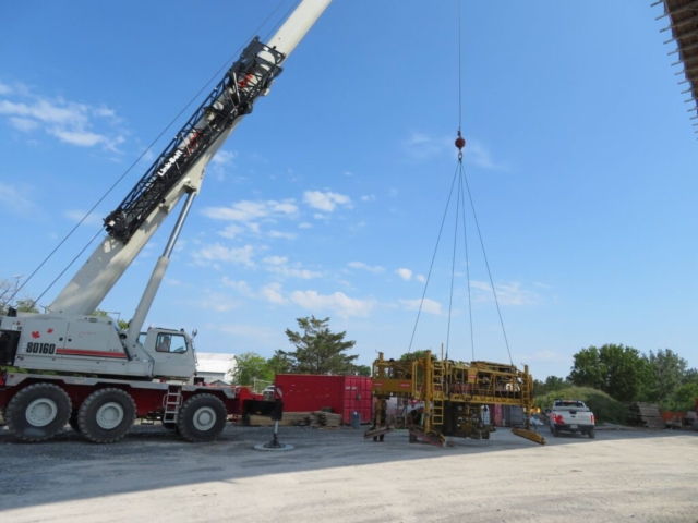 160-ton crane moving the concrete finisher