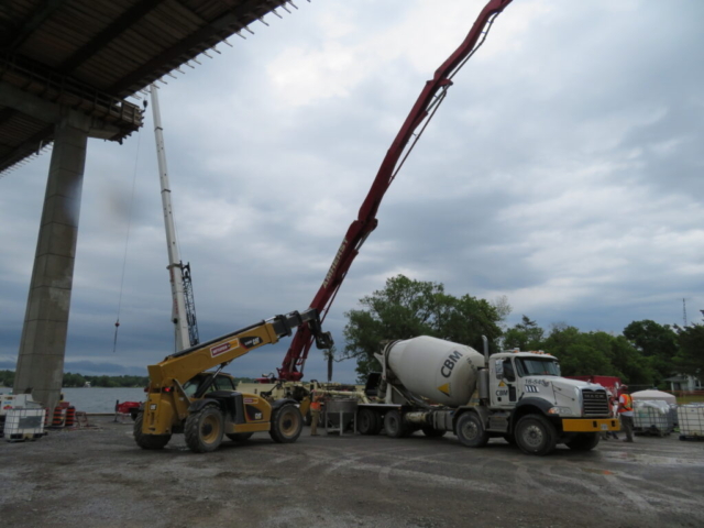 Overview, concrete pump, concrete truck and telehandler and hopper