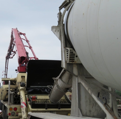 Concrete truck and pump preparing for the concrete deck placement