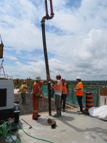 Installing a pipe on the concrete pump for concrete placement