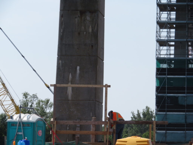 Building work platform on pier base 9