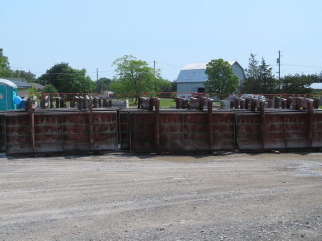 Barrier wall formwork delivered in preparation for concrete placement