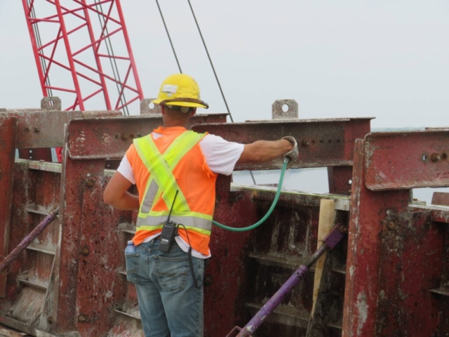 Pre-wetting the barrier wall forms