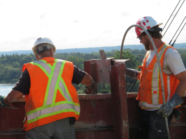 Troweling and vibrating the concrete