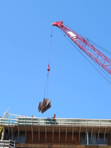 Removing the formwork from the placed concrete