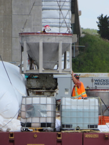 Releasing the concrete from the hopper into the concrete pump