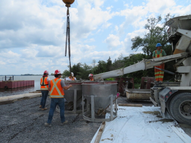 Filling the hoppers with concrete