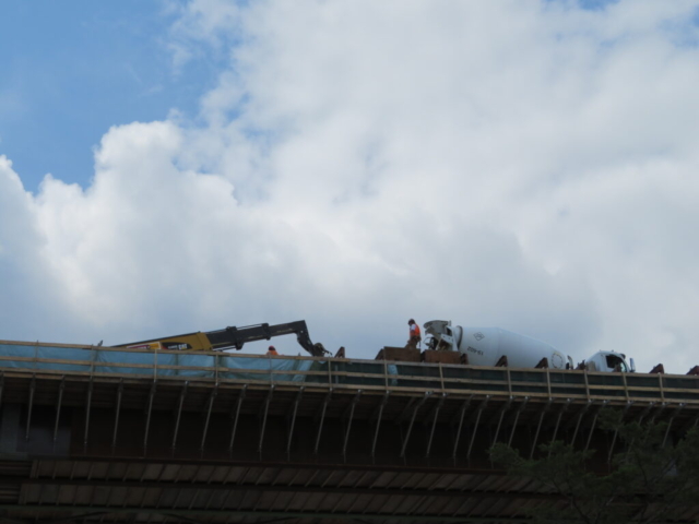 View from below of barrier wall concrete placement