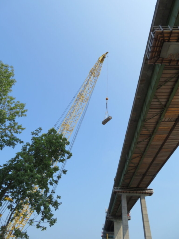 200-ton crane lifting materials to the deck for containment scaffolding