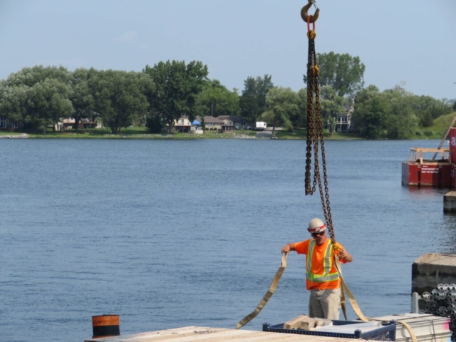 Preparing materials to be lifted by the 200-ton crane