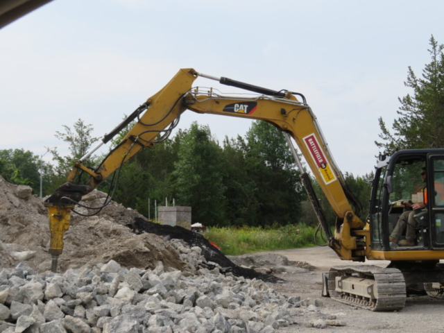 Hoe Ramming concrete rubble