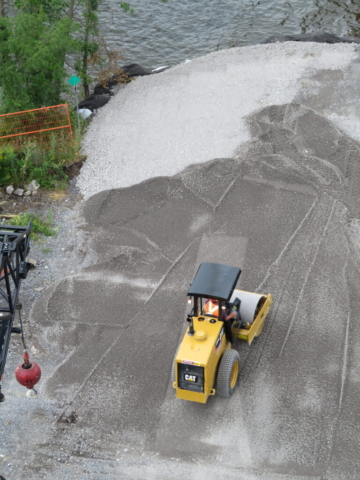 Using the roller to compact the new dock expansion