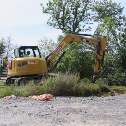 Using the excavator to start preparing for the new crane pad