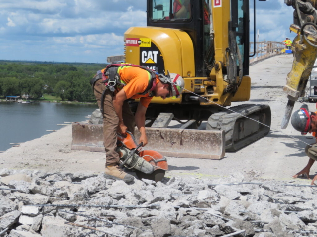 Cutting rebar during bridge deck demolition