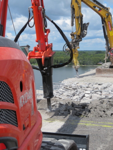 Hoe-ramming from the center of the deck out on both the north and south sides