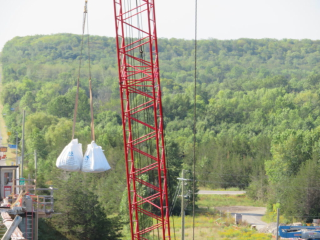 110-ton crane, meter bags filled with concrete rubble