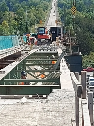 Removing the containment scaffolding from the section of removed deck