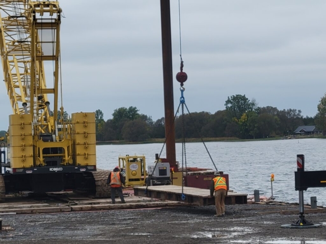 Moving the ramp into place with the crane