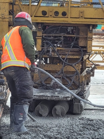 Close-up of concrete finisher, vibrating concrete