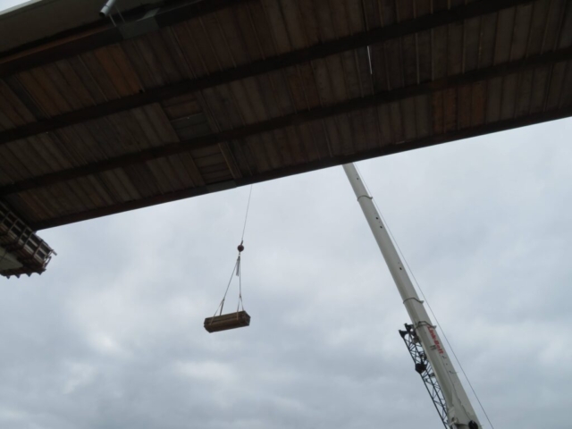 Formwork material being lifted by 160-ton crane